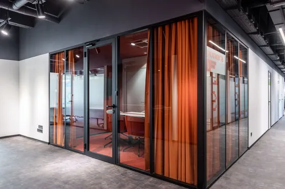 Private glass-walled office cabins